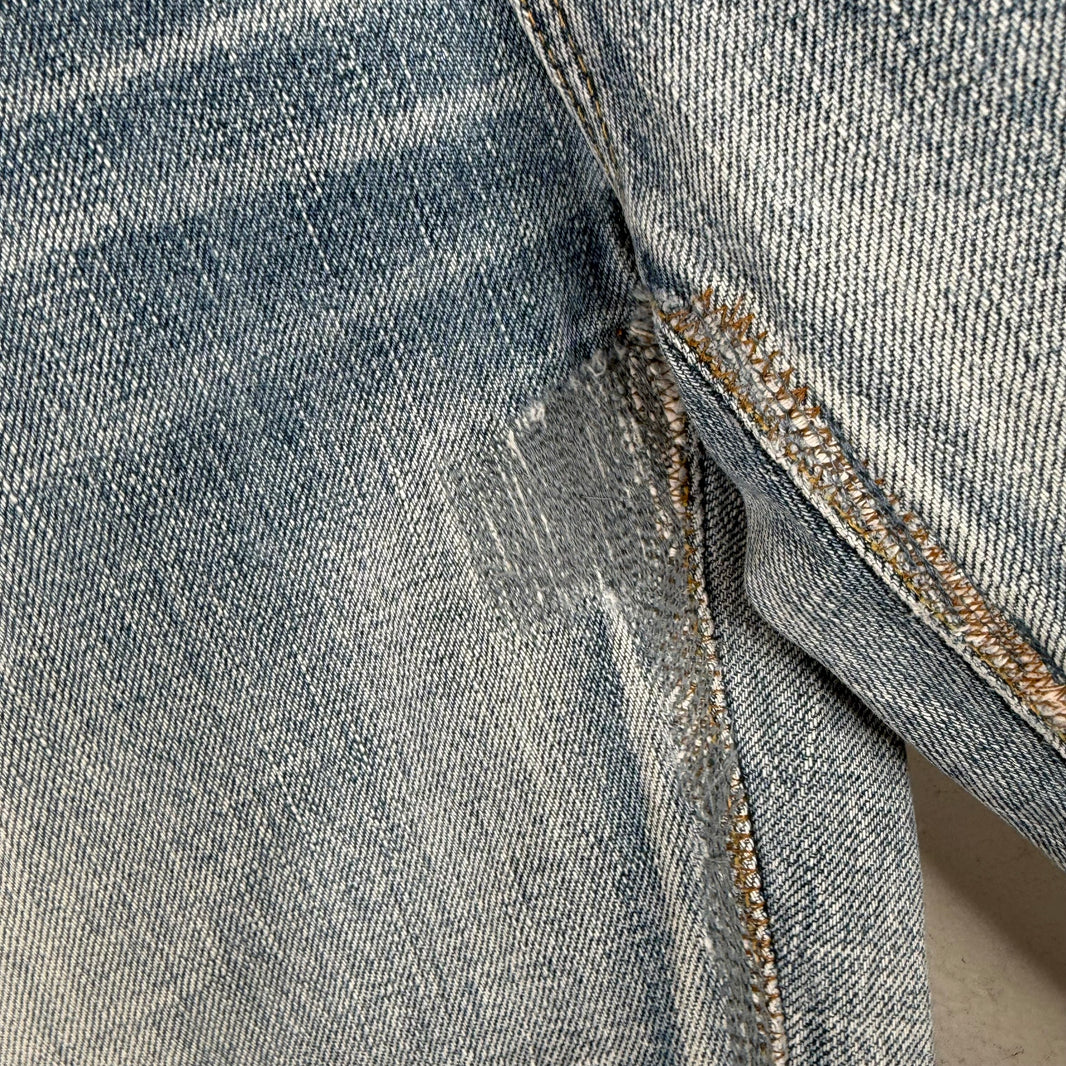Saint Laurent Light Washed Repaired D02 Jeans