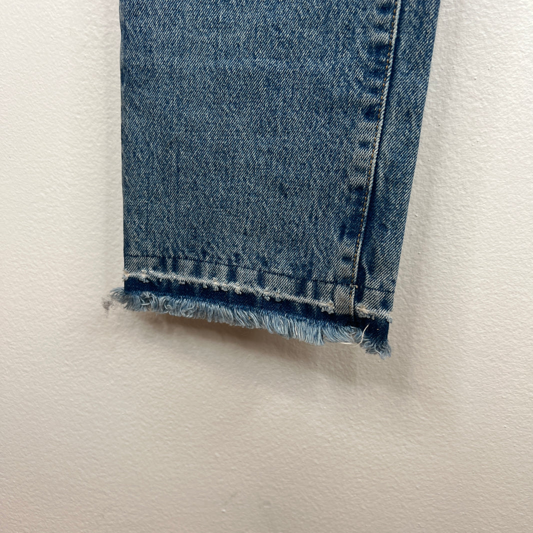 424 Distressed Light Wash Denim Jeans