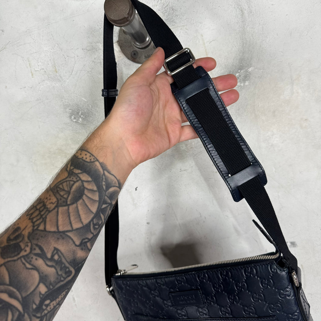 Gucci Monogram Embossed Messenger Bag