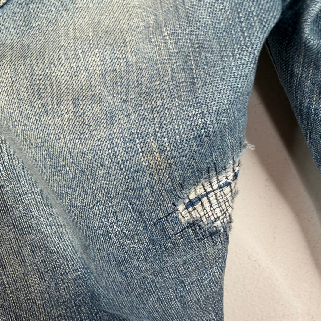 Saint Laurent Light Wash D02 Distressed Jeans