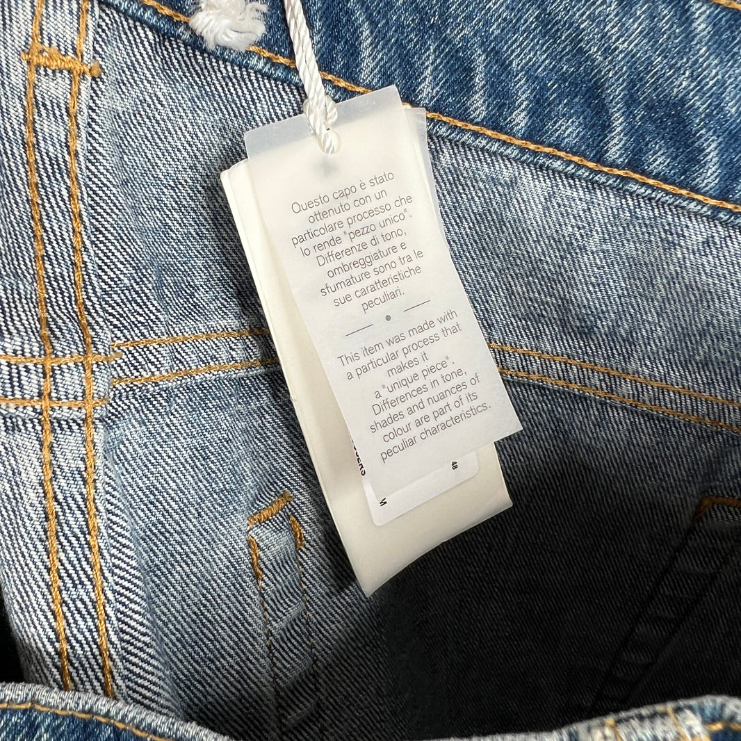 424 Distressed Light Wash Denim Jeans