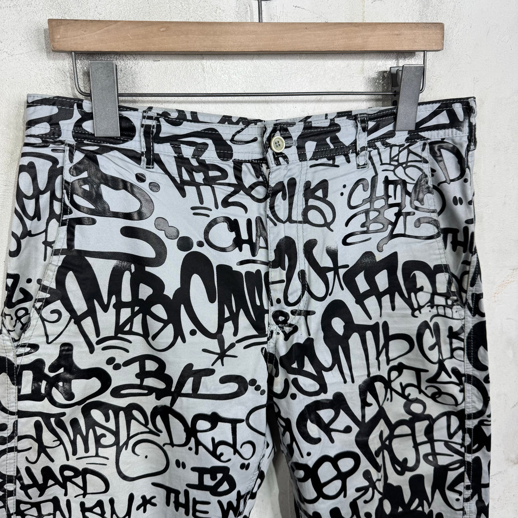CDG Printed Script Trousers