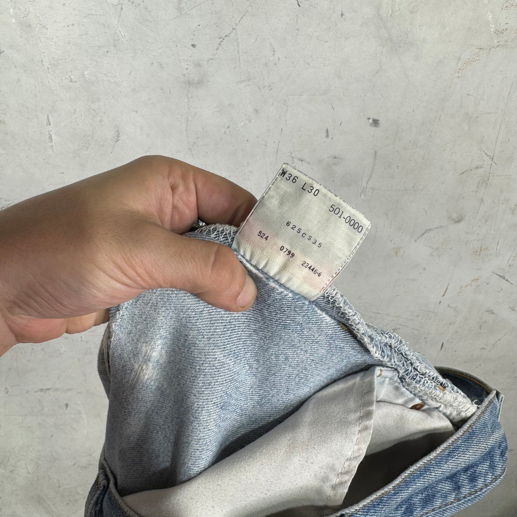 Vintage Levis 501xx Medium Wash Ripped Jeans