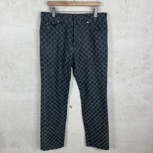 Gucci Denim Monogram Leather Trimmed Jeans