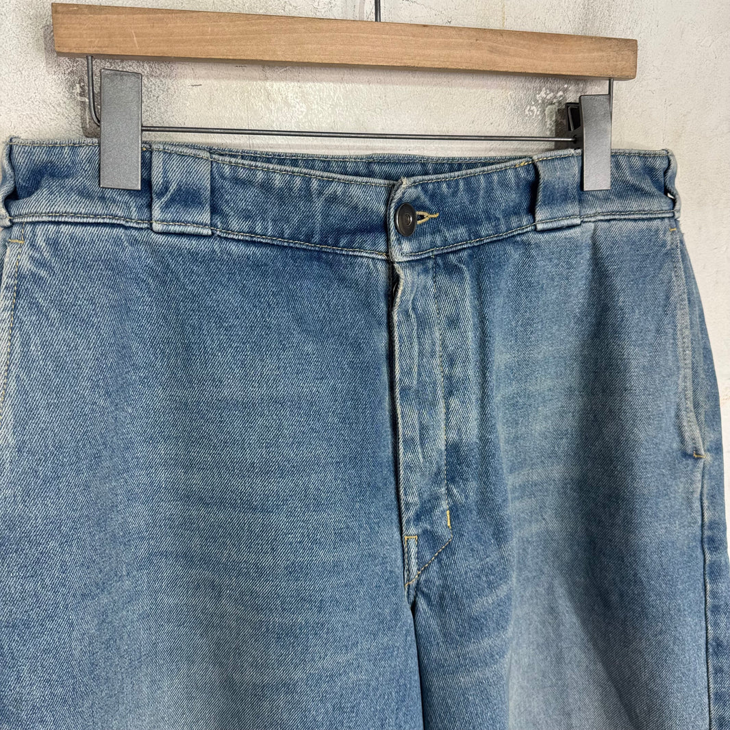 Prada Medium Wash Plaqued Denim Shorts