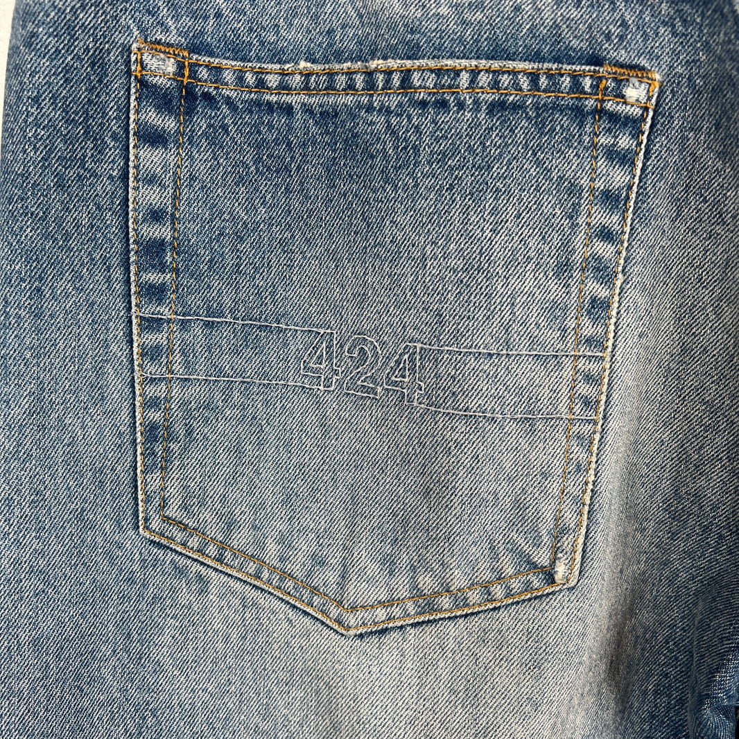 424 Distressed Light Wash Denim Jeans