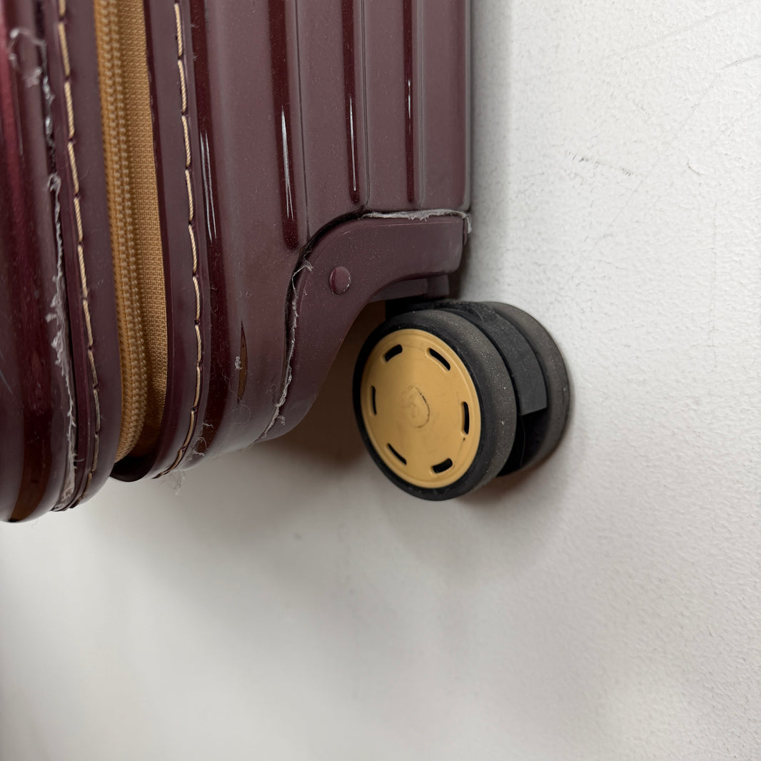 Rimowa Burgundy Check-In Suitcase