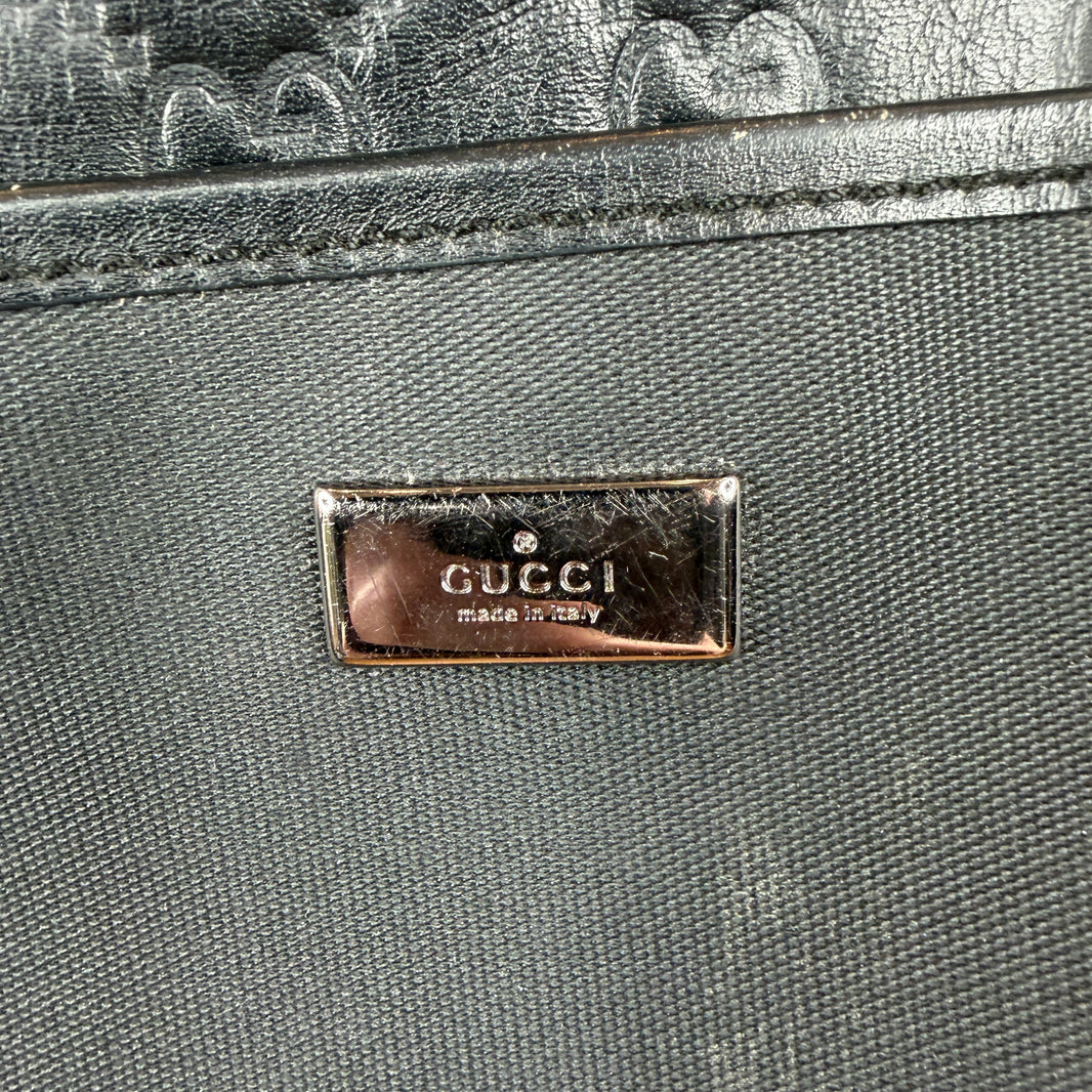 Gucci Leather Monogram Messenger Bag