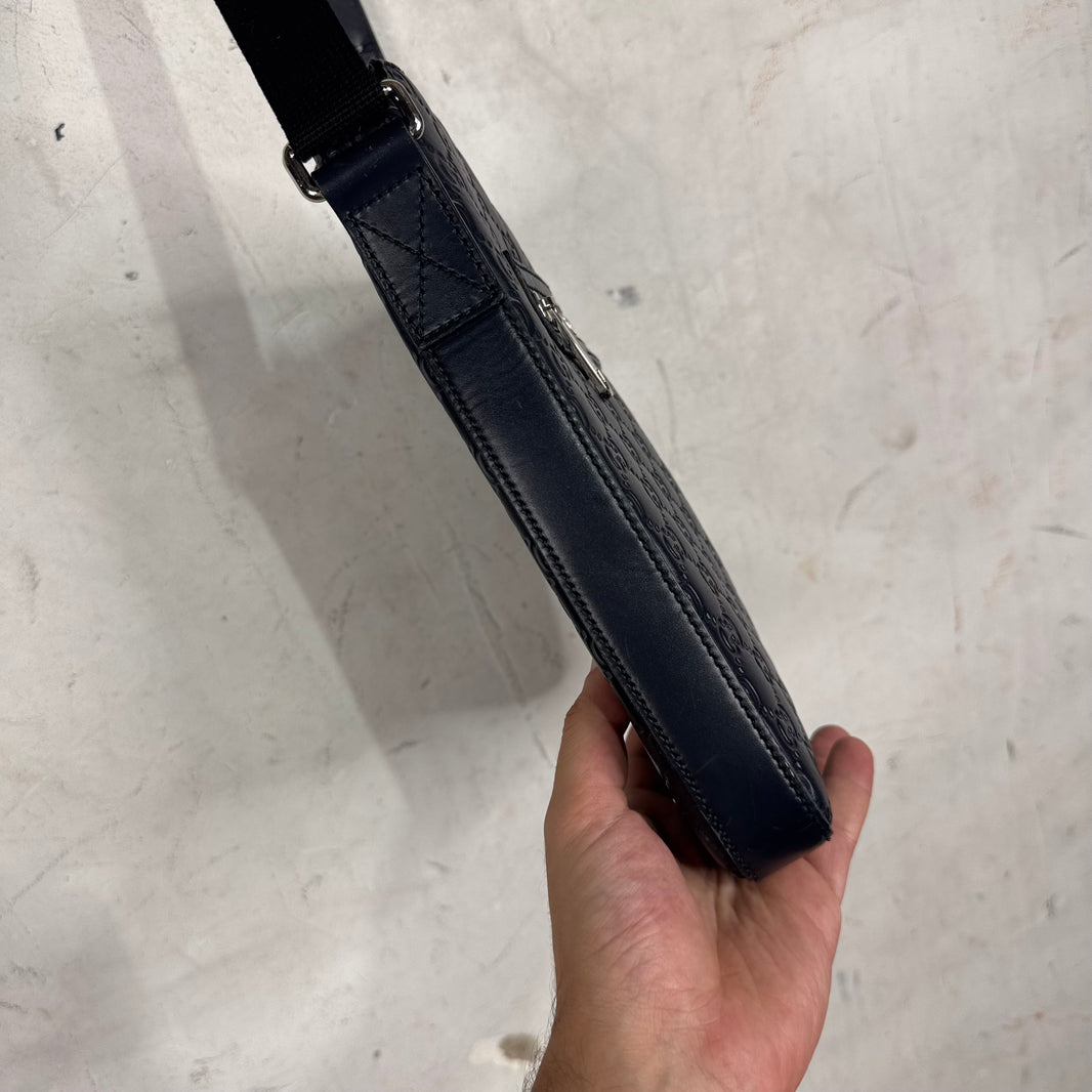 Gucci Monogram Embossed Messenger Bag