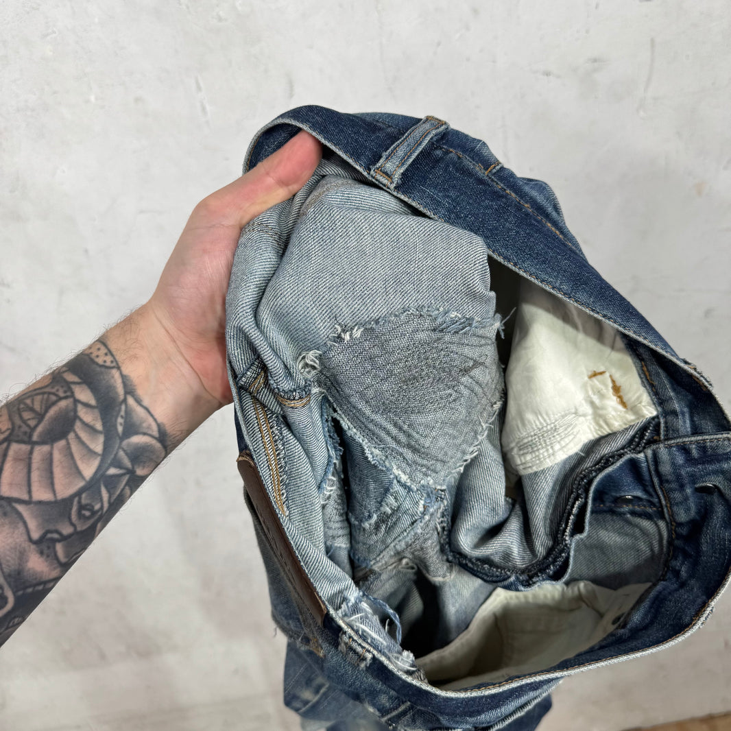 Prada Repaired Tapered Cut Jeans