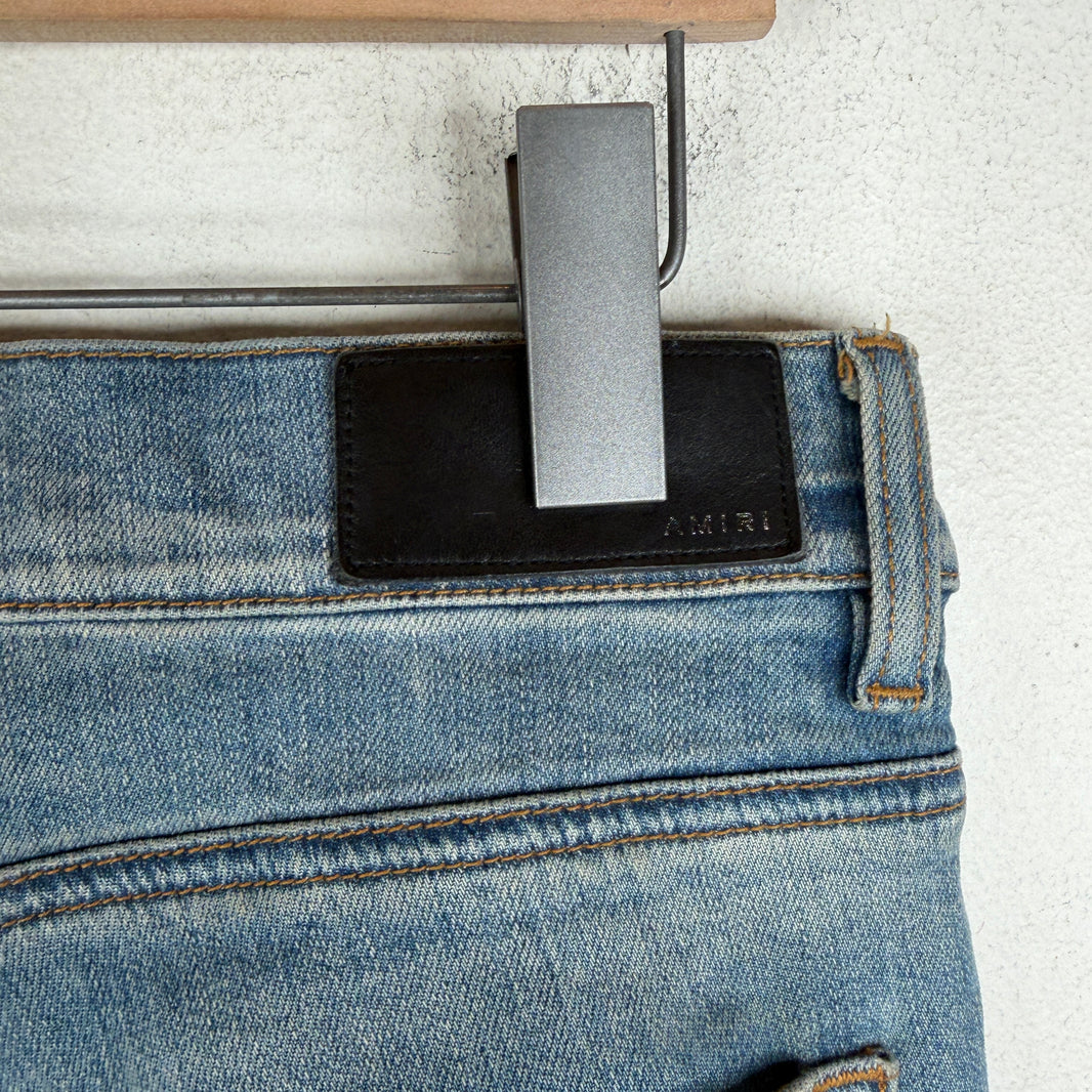 Amiri Distressed Blue Skinny Jeans