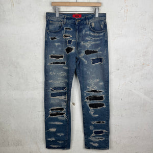 424 Distressed & Repaired Jeans