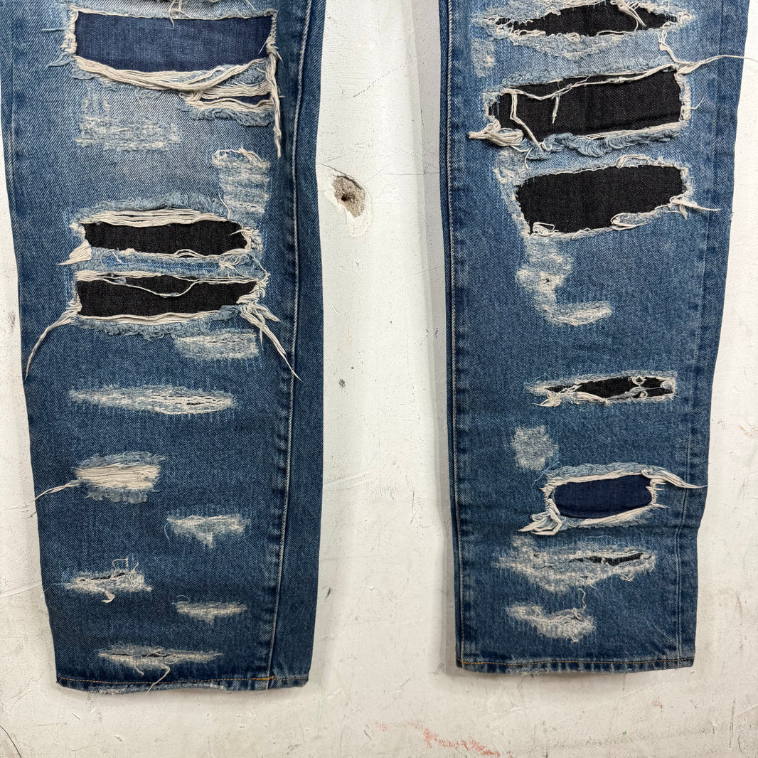 424 Distressed & Repaired Jeans