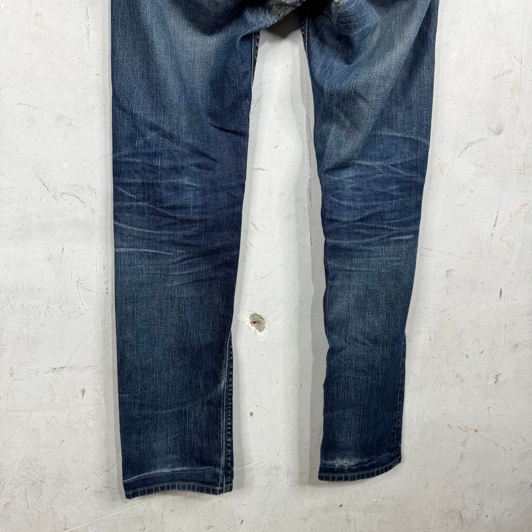 Prada Repaired Tapered Cut Jeans