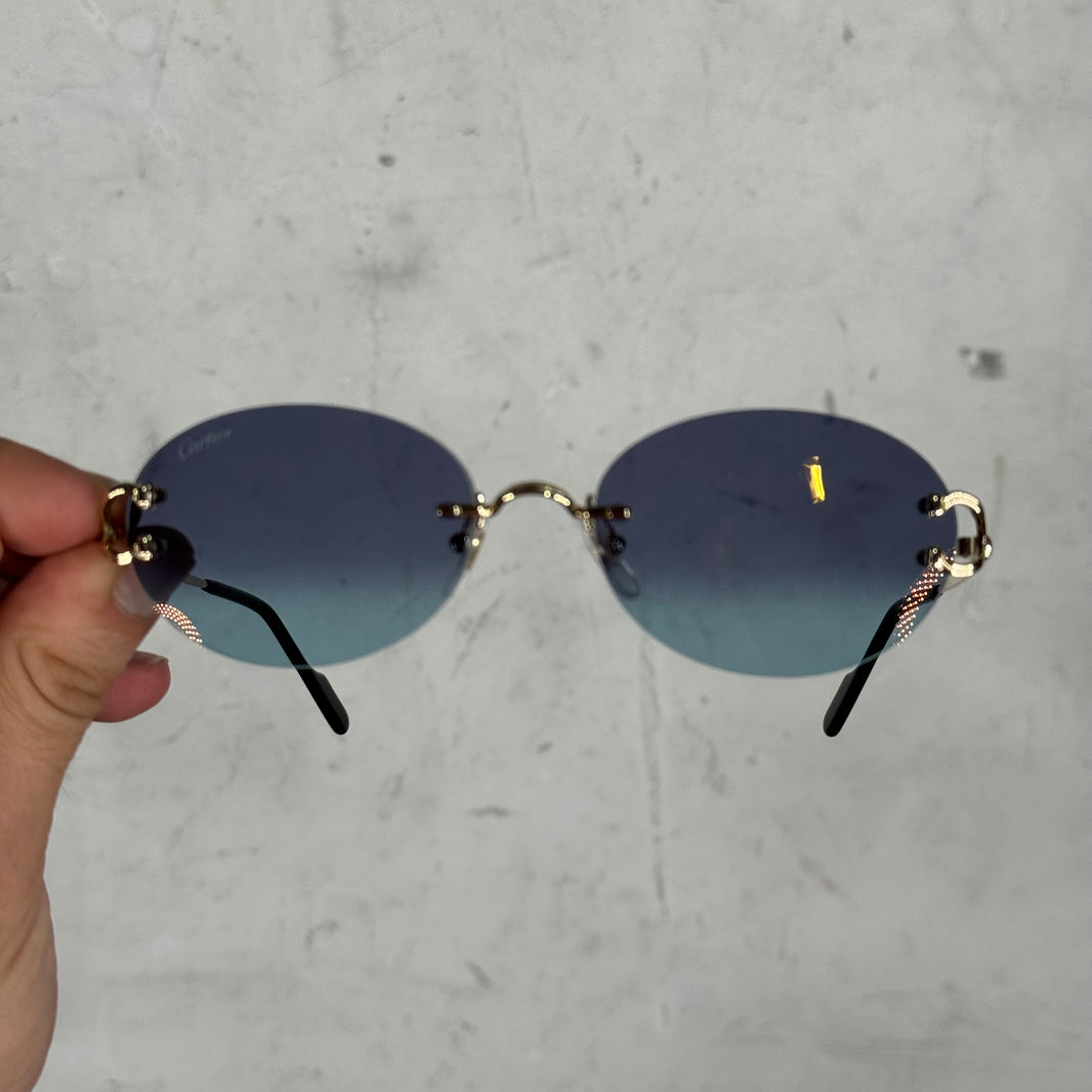 Cartier CT0551S Gold Wire Oval Sunglasses